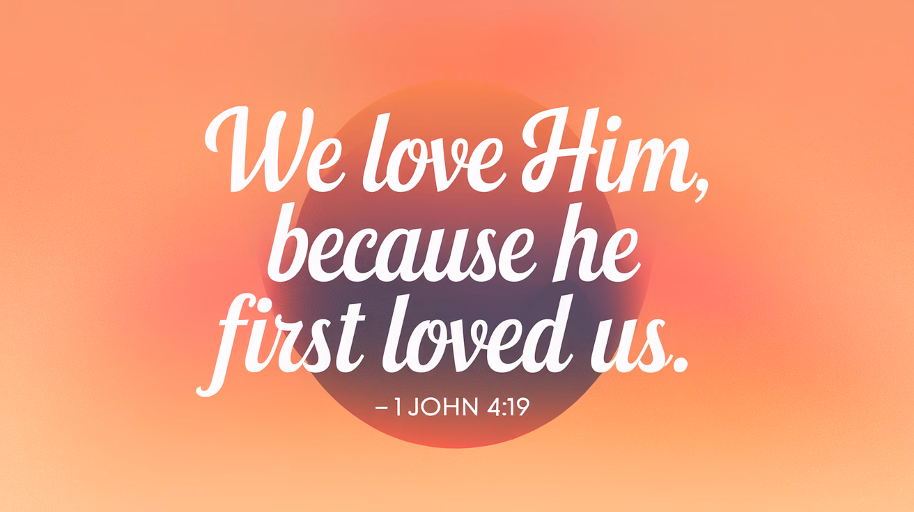 The main title 'We love him, because he first loved us.' floats in delicate white script. The quotation reference '– 1 John 4:19' rests below in a simple, elegant font. A warm pastel background with a gradient from peach to soft pink evokes the gentle beauty of a sunrise, enhancing the thoughtful mood.